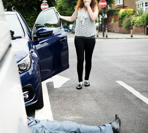 A Female Driver, Visibly Shaken, After Accidentally Hitting A Pedestrian.